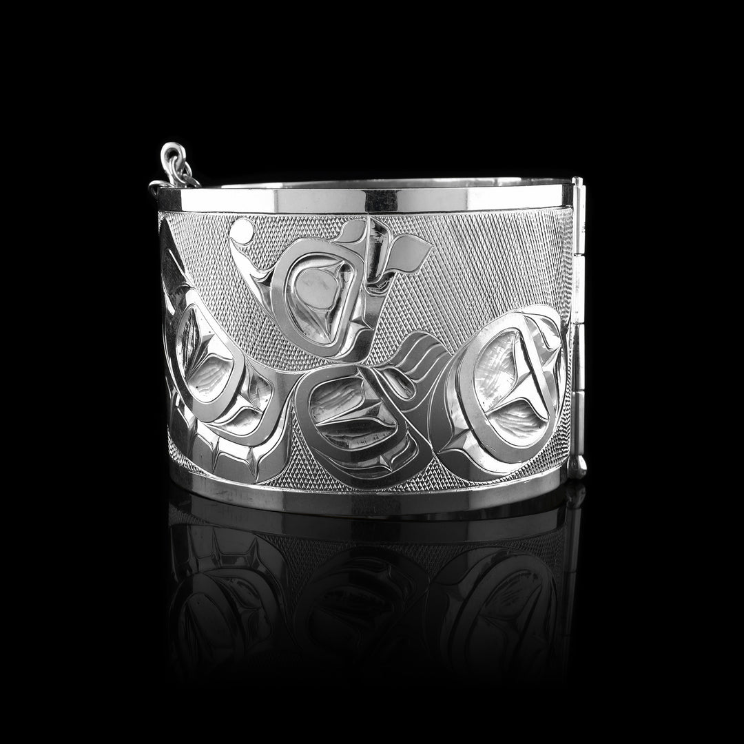 Sterling silver Bee and Otter hinge bracelet, handcrafted with detailed engraved designs.