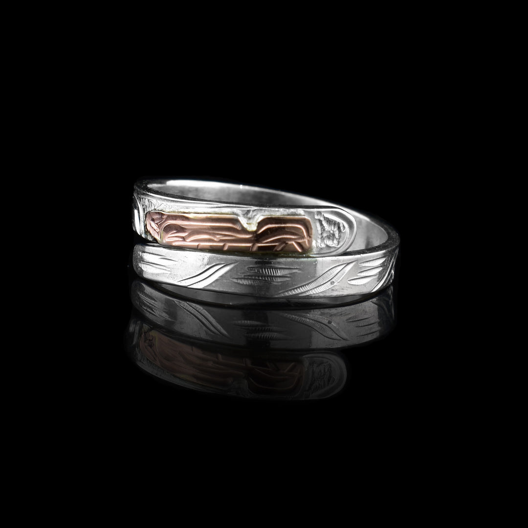 silver and rose gold wolf wrap ring made with sterling silver and the head of the wolf is made with rose gold