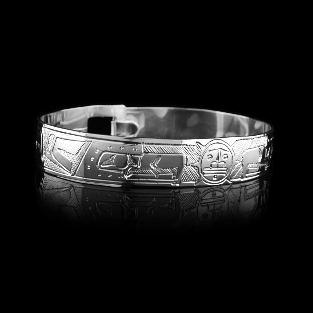 sterling silver Double Eagle and Sun Clasp Bracelet, two eagle heads on either side of the bracelet staring at the sun in the middle.