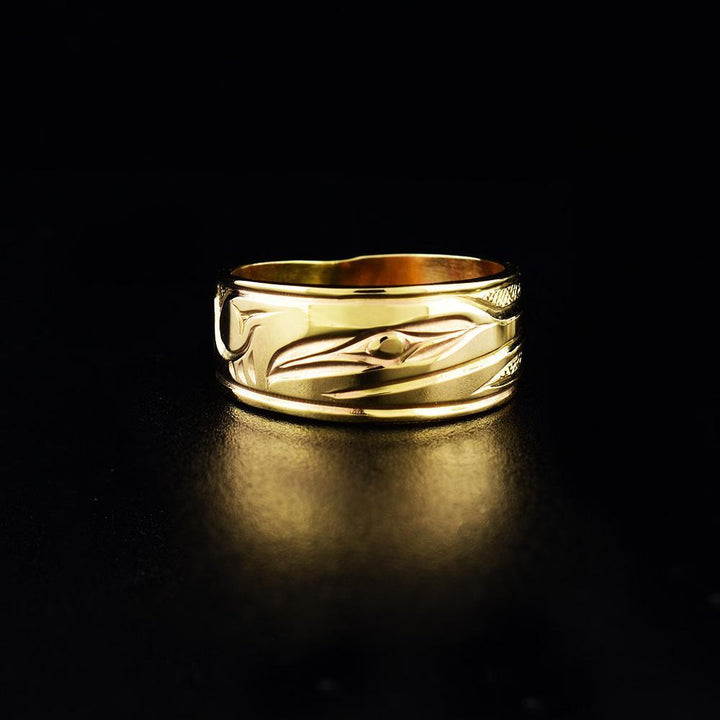 This Hummingbird ring is made from 14K gold and has a single, wide band that tapers slightly in the back. There are carvings on the surface of this solid gold ring that depict the Hummingbird.