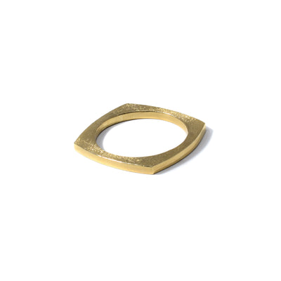 This 14K Gold Slim Mantra Ring is handmade by artist Pamela Lauz. The ring has a textured finish, giving it a striking appearance on both sides. Size 7 available.