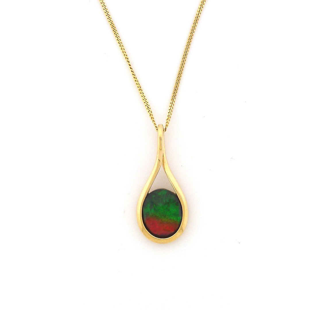 This ammolite pendant is made from 14K gold and A- grade ammolite gemstone. The gem is oval shaped and is cradled in 14K gold wires that make a teardrop shape.