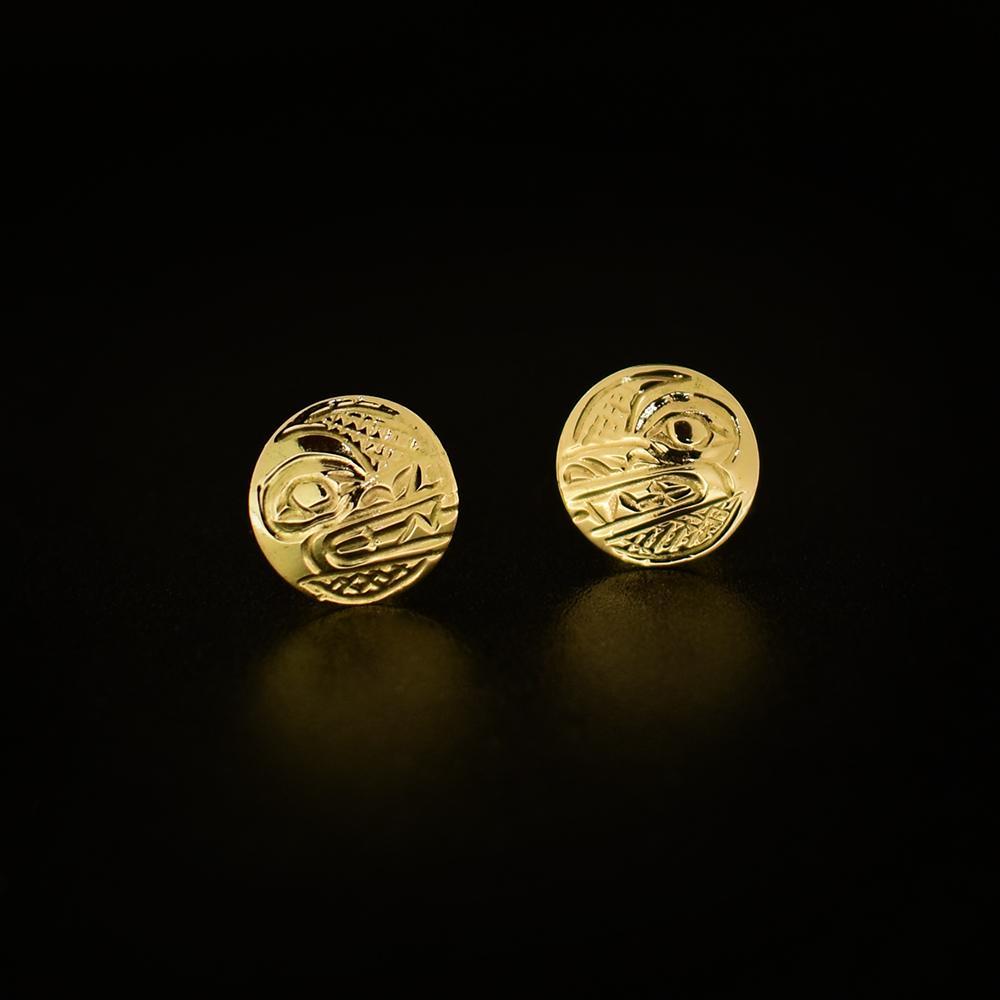 These Wolf earrings are made from 14K gold and are small and circle shaped. There are depictions of the Wolf carved into the surface of these stud earrings.