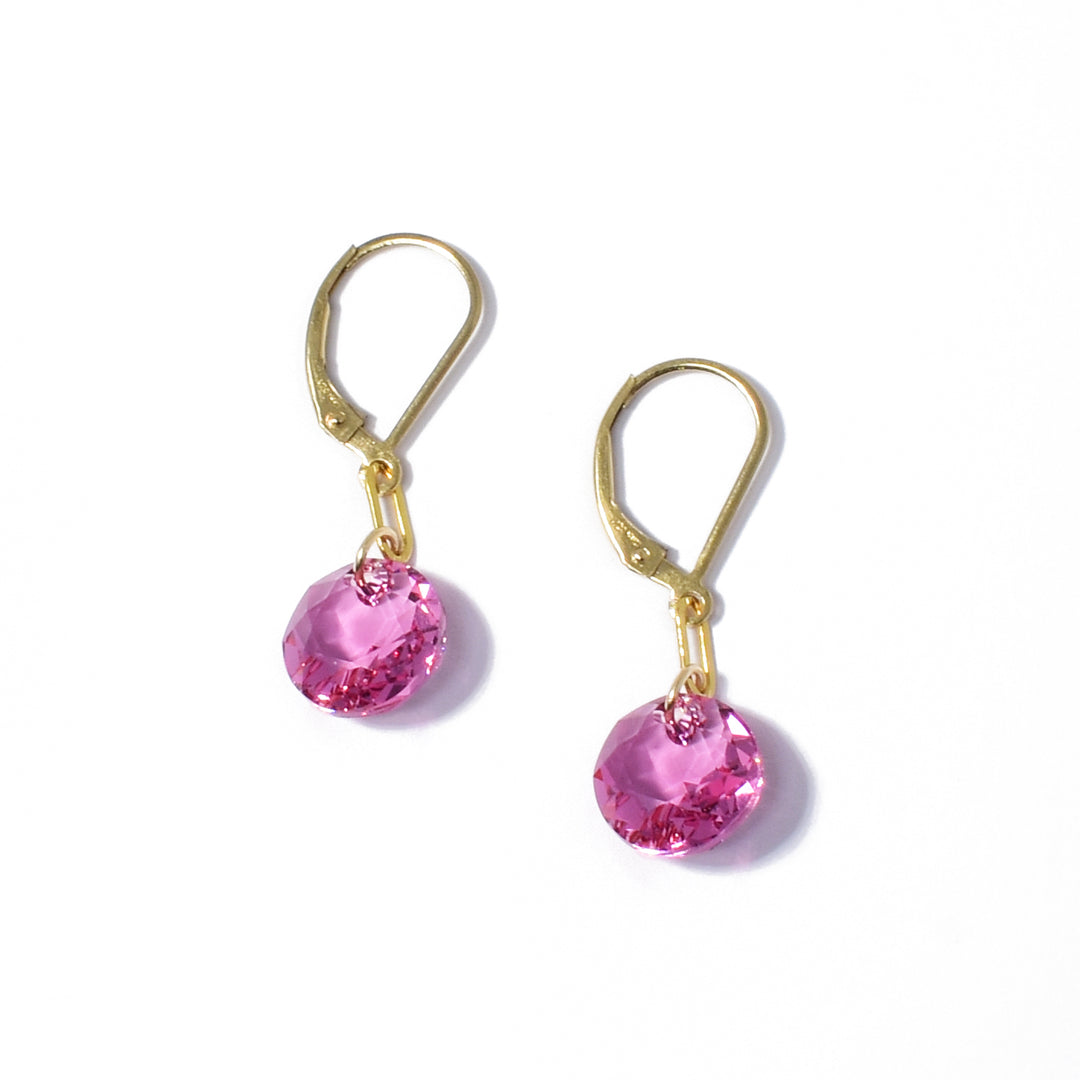 Delicate lever back earrings handcrafted by artist Debra Nelson. Made of Swarovski Crystal and 14K gold fill links and hooks. Each earring measures 1.31" x 0.38" including hook.
