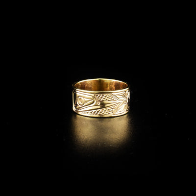 Hummingbird ring hand-carved by Cree and Coast Salish artist Richard Lang. Made of 14K gold. Width of band is 0.31". Size 6.75.