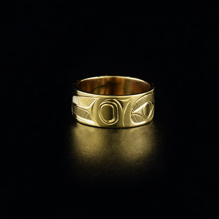 Hummingbird ring hand-carved by Haisla artist Hollie Bartlett. Made from 14K gold. 1/4" wide.