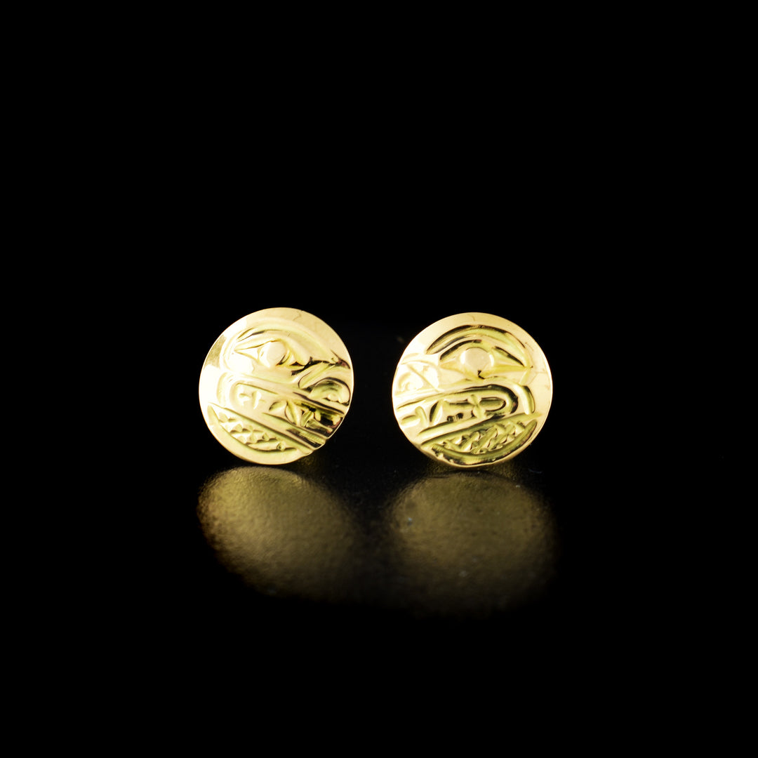 Bear stud earrings hand-carved by Kwakwaka'wakw artist Carrie Matilpi. Made of 14K gold. Each earring is 0.38" in diameter.
