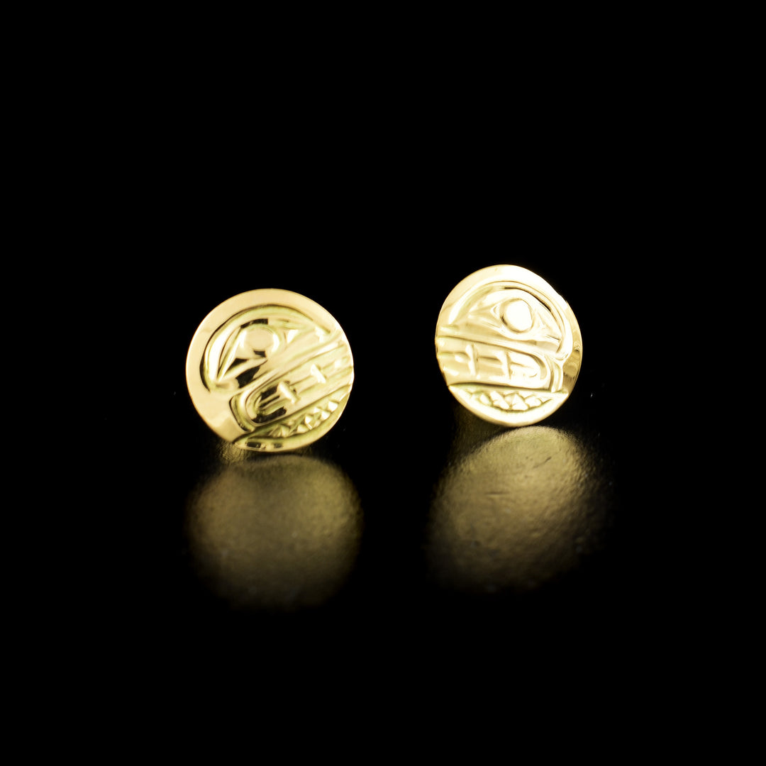 Orca stud earrings hand-carved by Kwakwaka'wakw artist Carrie Matilpi. Made of 14K gold. Each earring is 0.38" in diameter.