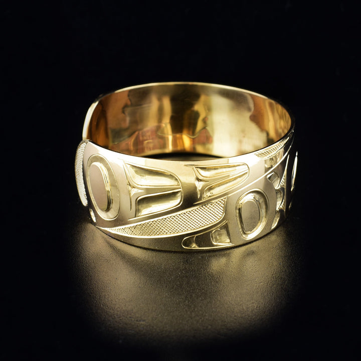 14K gold eagle bracelet hand-carved by artist Ivan Thomas. 6.25" long with 0.56" gap. 0.75" wide.