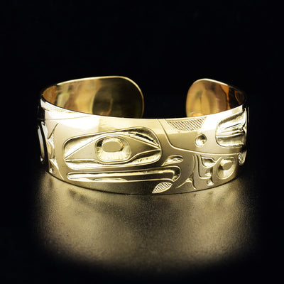 14K gold eagle bracelet hand-carved by artist Ivan Thomas. 6.25" long with 0.56" gap. 0.75" wide.