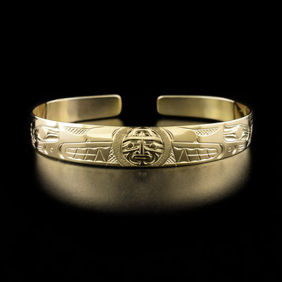 14K Gold 3/8" Wolf and Moon Bracelet by Harold Alfred. The design depicts the heads of two wolves facing inwards towards a moon.