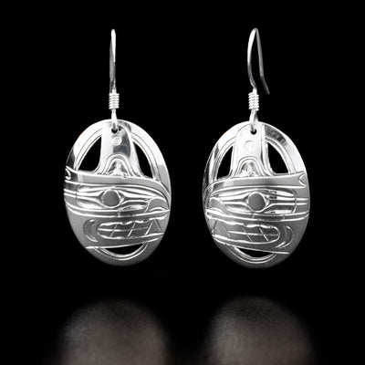 Sterling Silver Oval Orca Earrings by Harold Alfred. The design depicts the head of an orca with a fin in each earring.
