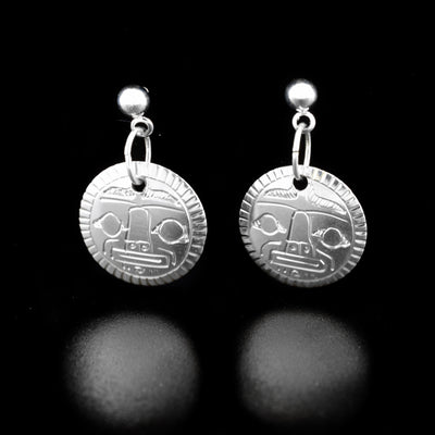 These Mini Sterling Silver Moon Dangle Earrings are handcrafted by Coast Salish artist Gilbert Pat.  Each earring measures 0.67" by 1.0" from the top of the earring.     The Moon Legend Represents: TRANQUILITY, GUIDANCE, PROTECTOR.