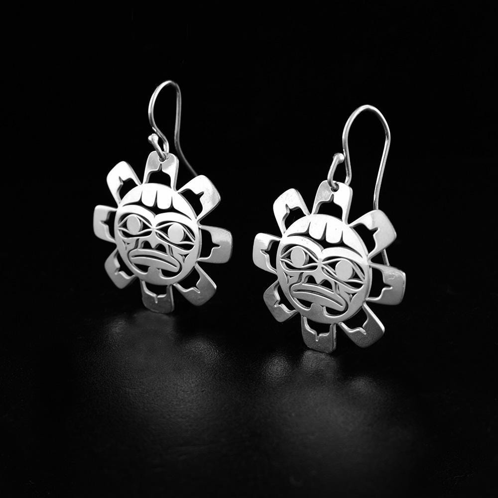These gorgeous dangling Sun earrings are made from sterling silver and have hangs shaped like the Sun. There are also cutout designs on the hangs that depict the Sun.