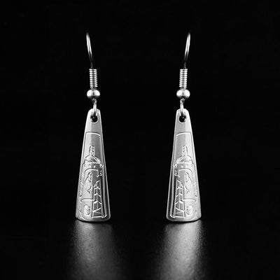 Sterling Silver Tricorner Bear Earrings by Gilbert Pat. Each earring is in the shape of a triangle. The artist has hand-carved the profile of a bear's head at the bottom of each earring. The bear is showing its sharp teeth and has a short ear on the back of its head.