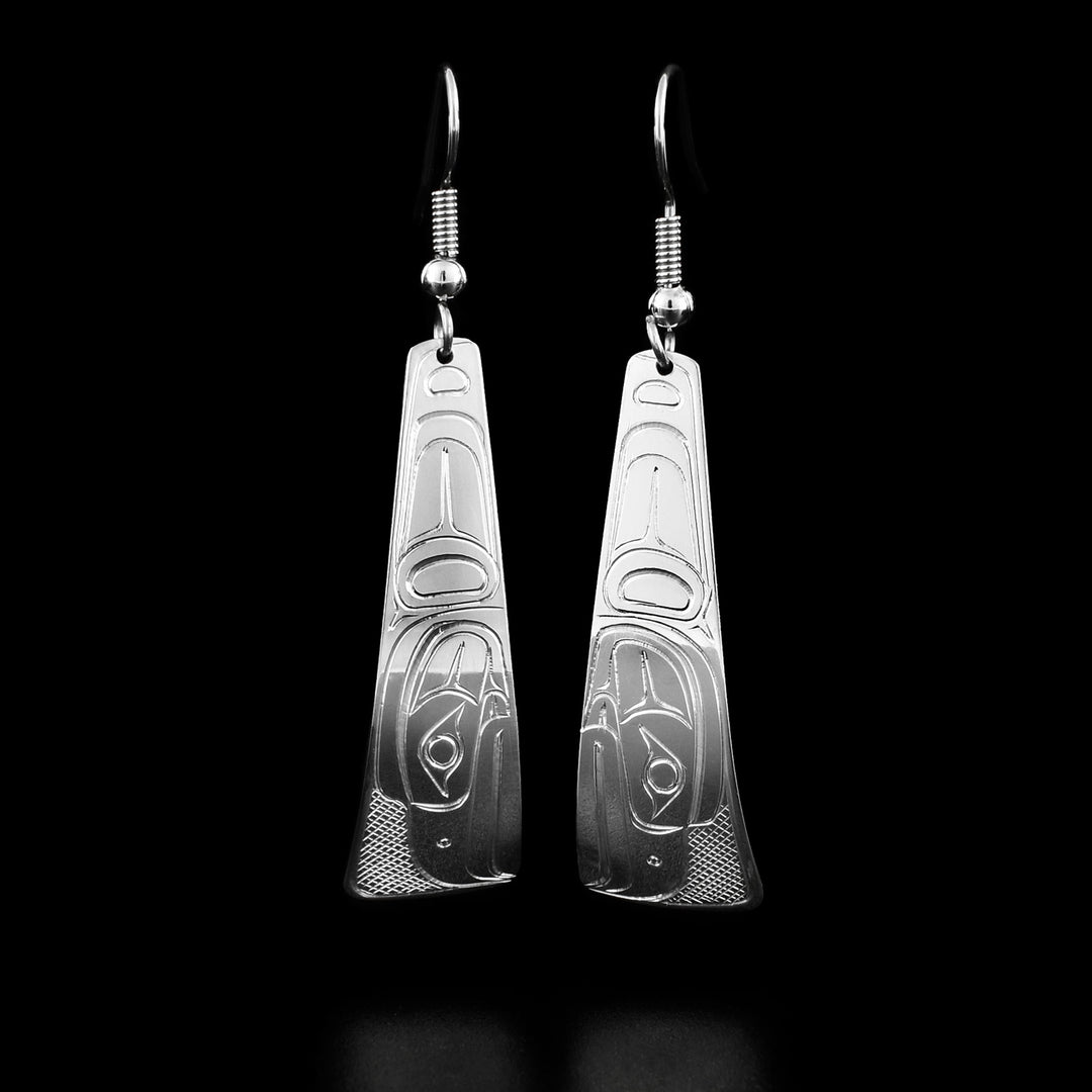 These Eagle earrings are triangle shaped and both have the profile of an eagle's head with a large feather facing downwards.