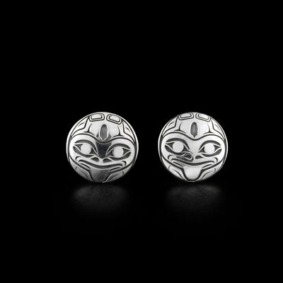 Sterling Silver Round Frog Stud Earrings by Grant Pauls. The design depicts a frog's face with its tongue sticking out. The background has been oxidized for the frog to stand out.