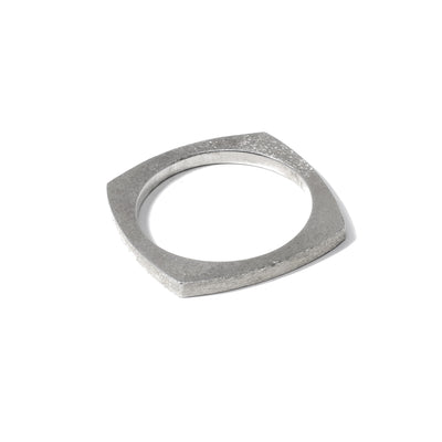 This Sterling Silver Slim Mantra Ring is handmade by artist Pamela Lauz.  The ring has a textured finish all around, giving it its striking appearance. Size 7 available.