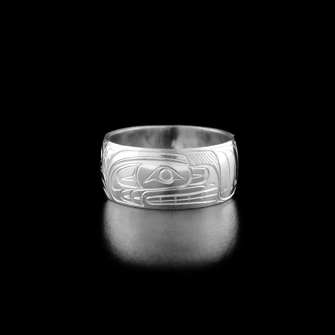 This Bear ring has the profile of a bear's head facing the right with a short snout and teeth showing.