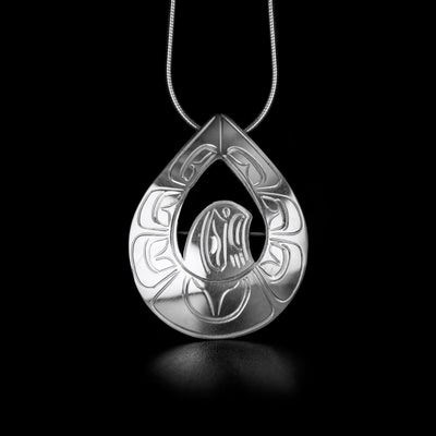 This Wings Up Eagle Pendant is handmade by Kwakwaka'wakw artist John Lancaster. He has used sterling silver to create this piece. The pendant measures 1.5" x 1.18". The chain is not included. The Eagle Legend Represents: POWER, INTELLIGENCE, VISION.