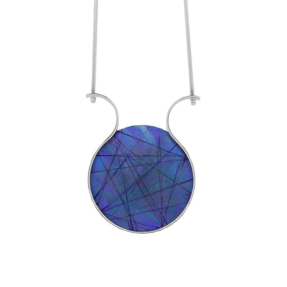This titanium necklace is made from sterling silver and anodized titanium and has a circle shaped pendant. The circle part of the pnedant is blue and made of titanium, the color and signs on the titanium has been achieved by anodizing it. There are silver wires curved out from the pendant.