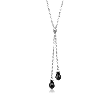 This Rutile Lantern Lariat Necklace is hand crafted by artist Pamela Lauz. The necklace is made from sterling silver with two rutile drops hanging down together.  The necklace measures 17" and the lariat hangs down 2.15" (5.5cm).