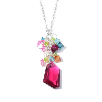 This Pink Swarovski Crystal Necklace is by artist Karley Smith. She has used sterling silver and Swarovski Crystal to make this piece.  The pendant measures 2.19" x 0.50".  The 24" sterling silver chain is included.