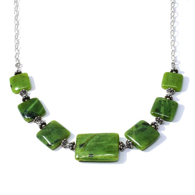 This BC Jade Multi Piece Square Rectangular Necklace is hand crafted by artist Karley Smith. It is made from sterling silver and BC jade.  The necklace is 18" long and the stones measure 0.50" x 0.50" to 1" x 0.75" in size.