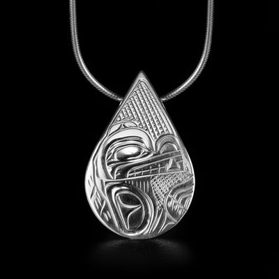 This Small Teardrop Wolf Pendant is handmade by Kwakwaka'wakw artist, Victoria Harper. She has used sterling silver to create this piece. The pendant measures approximately 1.18" x 0.8". There is a hidden bail in the back. The chain is not included. The Wolf Legend Represents: LOYALTY, TEACHER, COOPERATION.