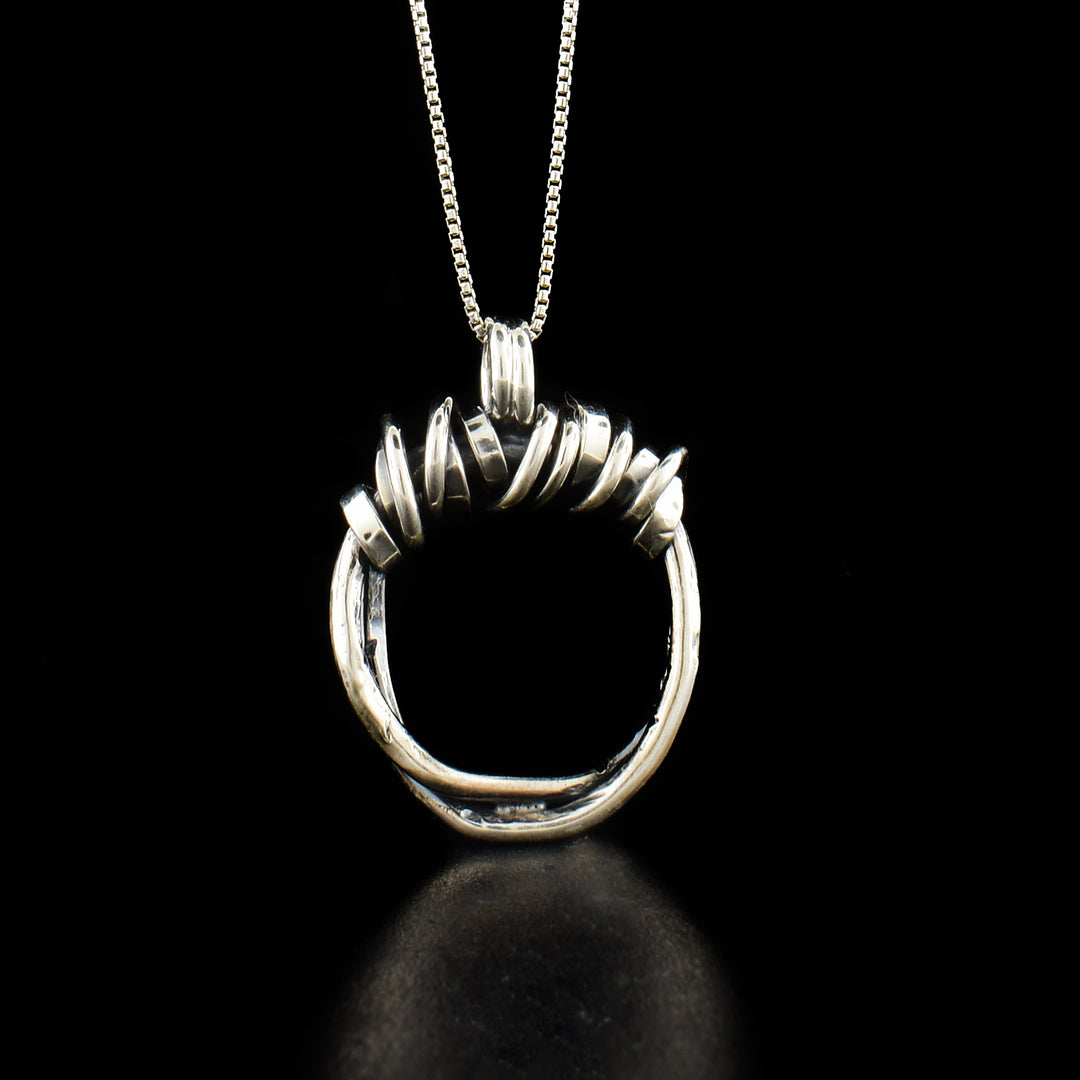 Sterling Silver Twist of Fate Necklace hand crafted by artist Joy Annett.