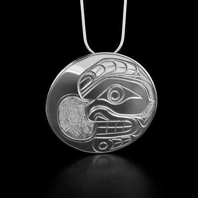 Sterling Silver 2" Round Wildman Pendant by Paddy Seaweed. The design depicts a wildman with an angry expression facing the left.