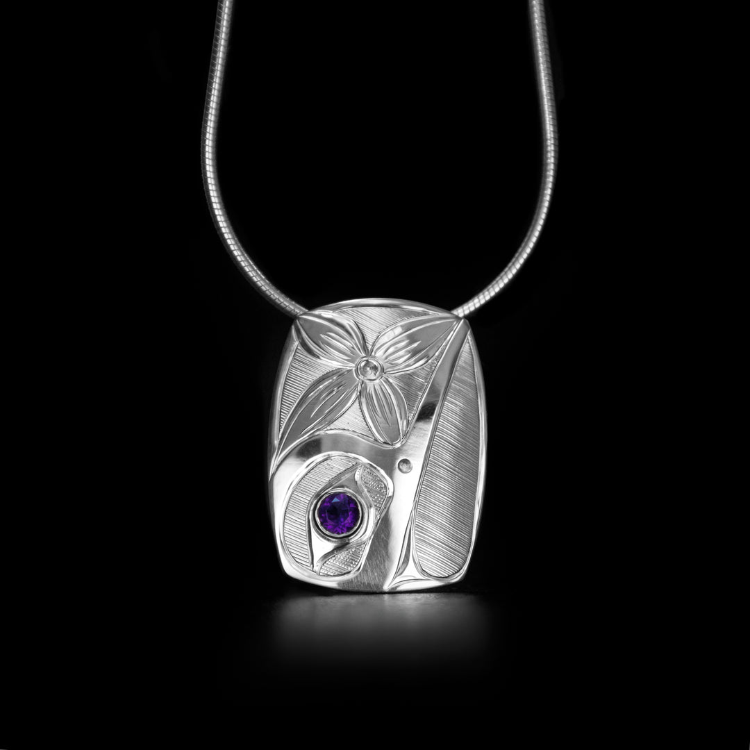 Rectangular Hummingbird Pendant with Amethyst hand-carved by Haisla artist Hollie Bartlett.