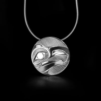 Sterling Silver Round Eagle Pendant hand-carved by Haisla artist Hollie Bartlett.