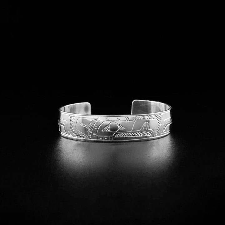 Sterling silver baby eagle bracelet hand-carved by Coast Salish artist Gilbert Pat. 4.13" long with 0.81" gap.