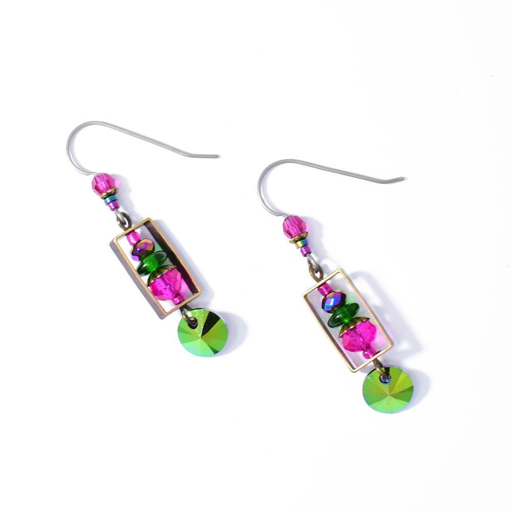 These crystal drop earrings are made from hand worked brass, glass beads and Swarovski crystals.