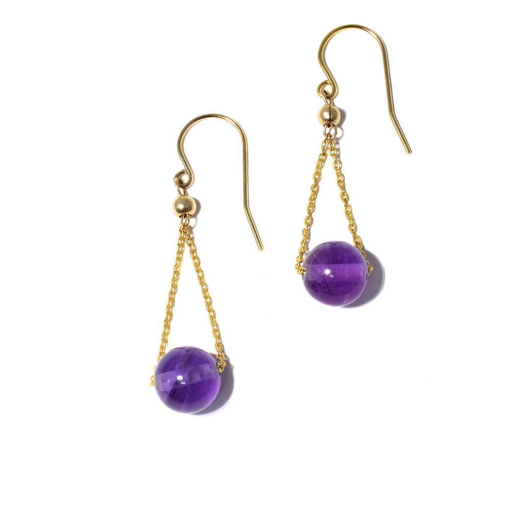These 14K Gold Fill Amethyst Short Chandelier Earrings are handmade by artist Pamela Lauz.  Handcrafted with genuine amethyst, each earring measures 1.5" x 0.40".