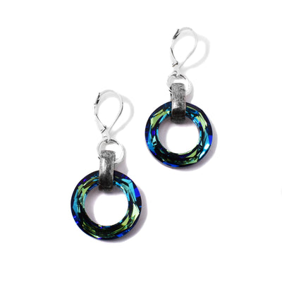 These Large Swarovski Crystal Ring Earrings are handcrafted by artist Karley Smith. She has used sterling silver, antiqued silver, and Swarovski Crystal to create them.  Each earring measures 1.63" x 0.75" including the hook.