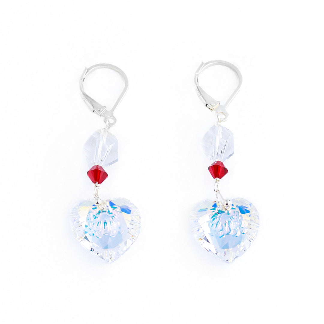 Swarovski Crystal Heart Dangle Earrings handcrafted by artist Debra Nelson. She has used sterling silver for the lever back hooks and Aurora Borealis Swarovski Crystal to create them. Each earring measures 1.75" x 0.55" including the hook.
