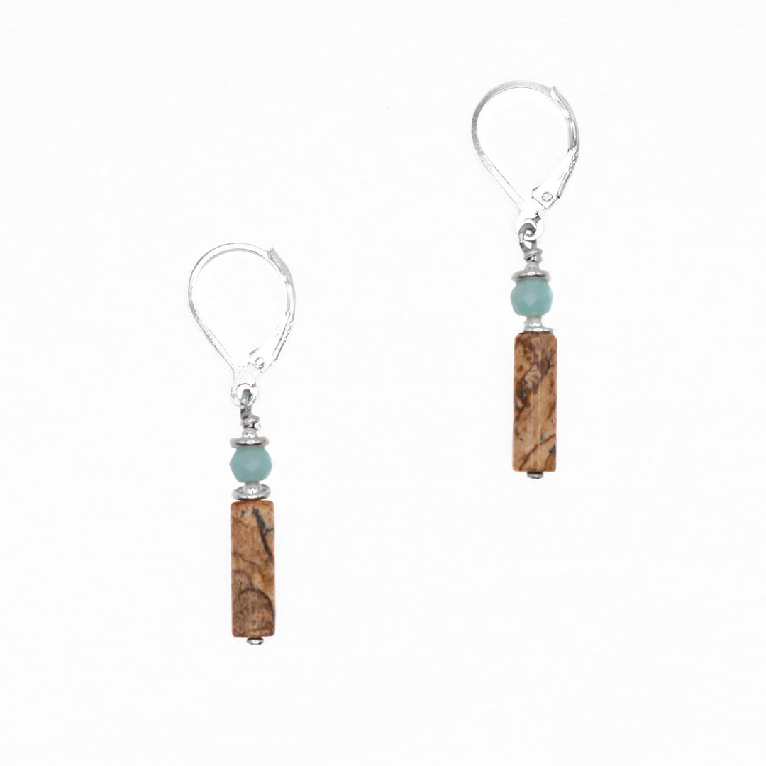 These jasper earrings have sterling silver hooks with beautifully cut amazonite beads held between silver and below that are long, cylindrical jasper pieces.