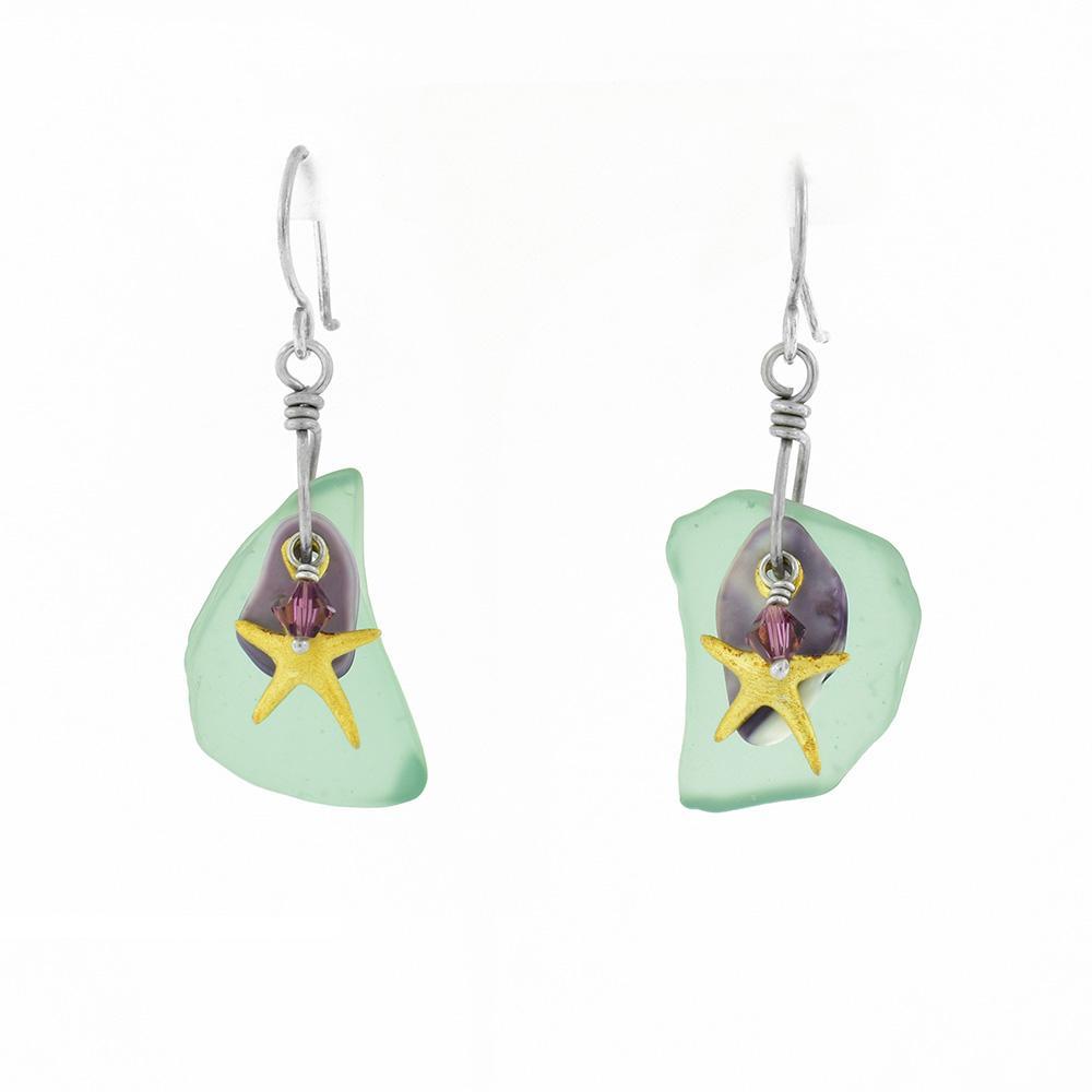 These gorgeous ocean earrings are made from gold vermeil, sterling silver, Swarovski crystals, mother of pearl and sea glass. The hooks are made from silver and have sea glass, mother of pearl, pink Swarovski crystals and gold vermeil starfish dangling from them.