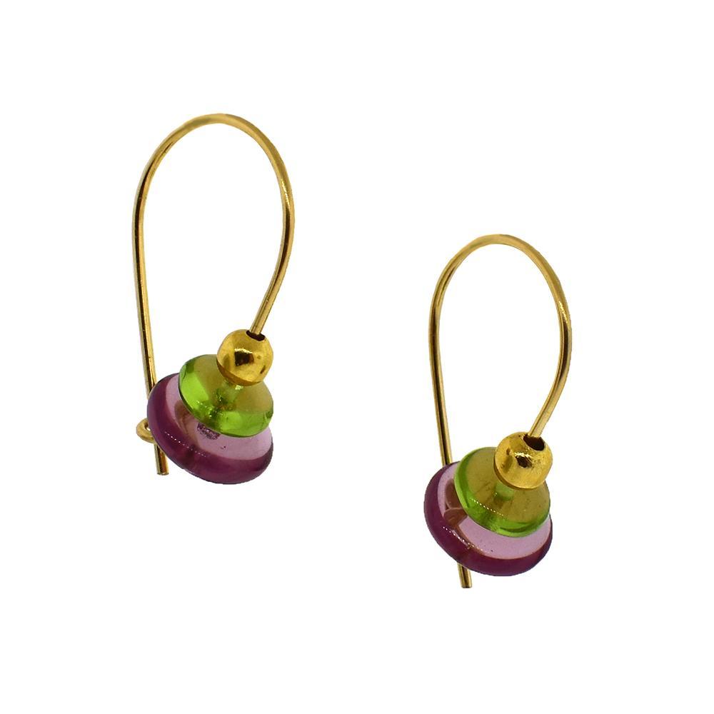 These bead hoop earrings are made from gold fill and glass beads. The gold fill hoops curve below the ear and you can interchangeably add up to three colorful beads to each earring