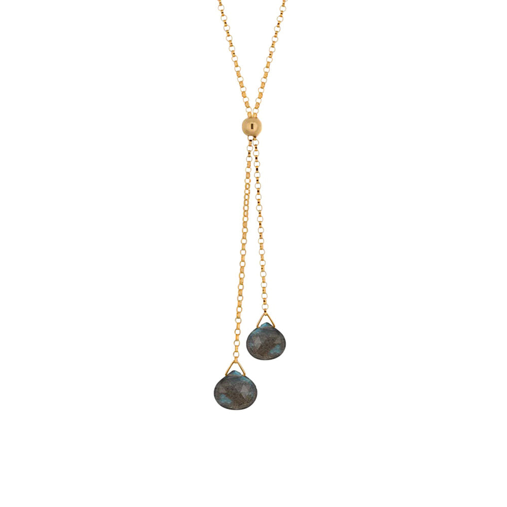 These lariat labradorite necklace is made from 14K gold fill and labradorite gemstones. The gems are teardrop shaped and are displayed from two elegant lariats that hang below the necklace.