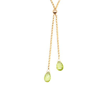 This Gold Fill Peridot Lantern Lariat Necklace is hand crafted by artist Pamela Lauz. The necklace is made using 14k gold-filled chain and genuine peridot.  The necklace is 17" long and the lariat drops down an additional 2.25".