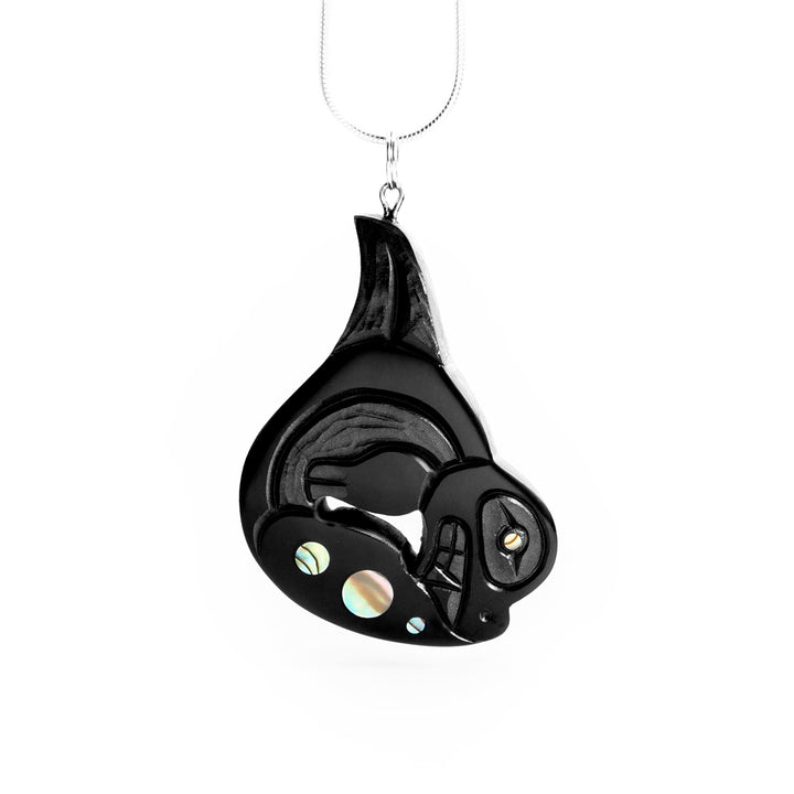 Argillite Breaching Orca Pendant (facing the right) hand carved by Haida artist Amy Egdars.