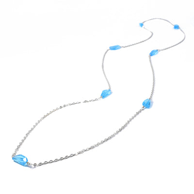 This Blue Topaz Station Necklace is handmade by artist Pamela Lauz.  She has used sterling silver for the chain and blue topaz across the necklace.  The necklace is 19" long.