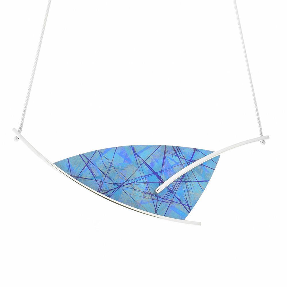 This unique titanium necklace is made from sterling silver and anodized titanium with a triangular pendant. The pendant is blue with colorful designs that have been achieved by anodizing the titanium and there are sterling silver branches extending across and out of the pendant.