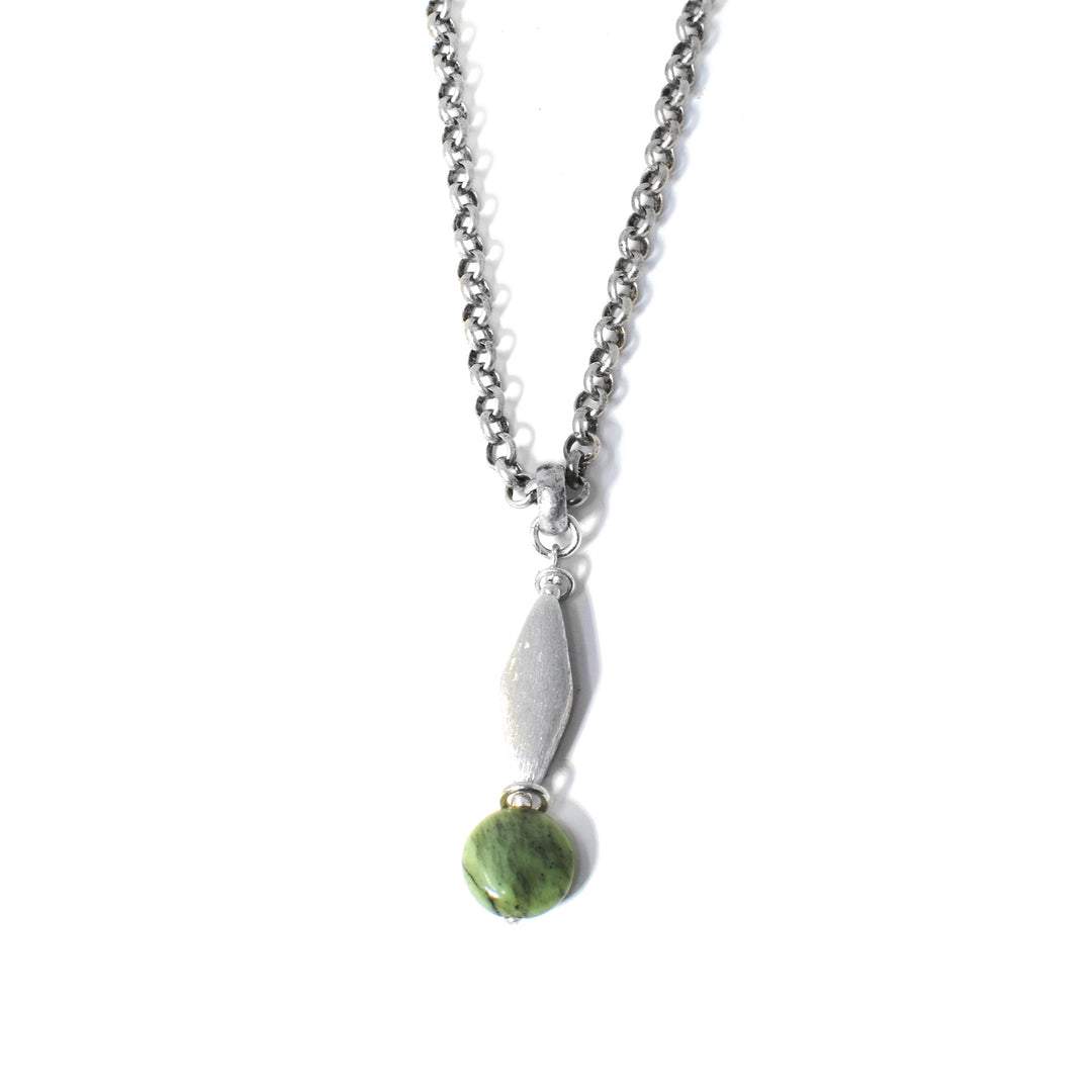 This jade pendant necklace is handcrafted by artist Karley Smith. She has used sterling silver, antique silver, brushed silver, and BC jade to create the pendant.  The pendant measures 1.69" x 0.38", including the bail. The 24" antique silver chain is included.