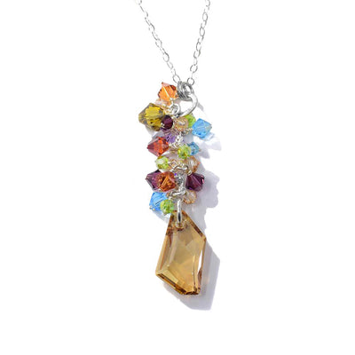This Cream Swarovski Crystal Necklace is by artist Karley Smith. She has used sterling silver and Swarovski crystal to make this piece.  The pendant measures 2.63″ x 0.50″.  The 24" chain is included.