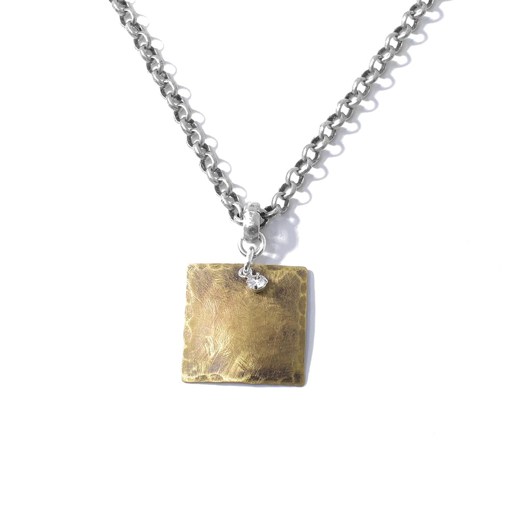 This Bronze and Swarovski Crystal Pendant on Oxidized Silver Chain is handcrafted by artist Karley Smith.  The chain is 19.5" long and the pendant measures 1.25" x 0.81".