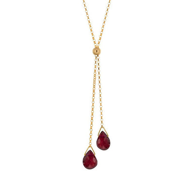 This Gold Fill Garnet Lantern Lariat Necklace is hand crafted by artist Pamela Lauz. The necklace is made using 14k gold-filled chain and two genuine garnet drops.  The necklace is 17" long and the lariat hangs down an additional 2.15".
